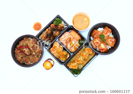 Set of Japanese food, pork rice, salmon pickle, salmon sushi rolls, and takoyaki or squid balls on white background. Set of Japanese food, pork rice, salmon pickle, salmon sushi rolls, and takoyaki or squid balls on white background. 100601157