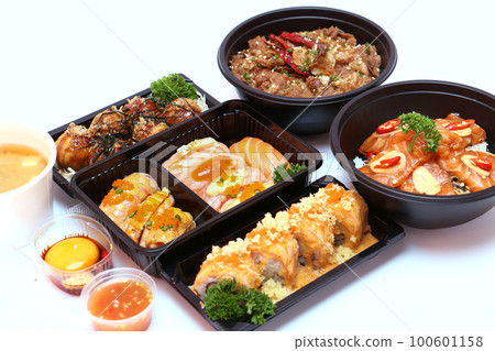 Set of Japanese food, pork rice, salmon pickle, salmon sushi rolls, and takoyaki or squid balls on white background. Set of Japanese food, pork rice, salmon pickle, salmon sushi rolls, and takoyaki or squid balls on white background. 100601158