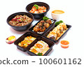 Set of Japanese food, pork rice, salmon pickle, salmon sushi rolls, and takoyaki or squid balls on white background. 100601162