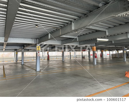 Large empty indoor parking lot 100601517