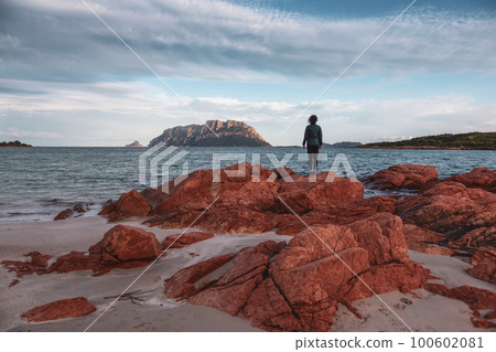 Rocky and Sandy Beach in Porto Istana, Sardinia, Italy. Tavolara Island in Background. Rocky and Sandy Beach in Porto Istana, Sardinia, Italy. Tavolara Island in Background. 100602081