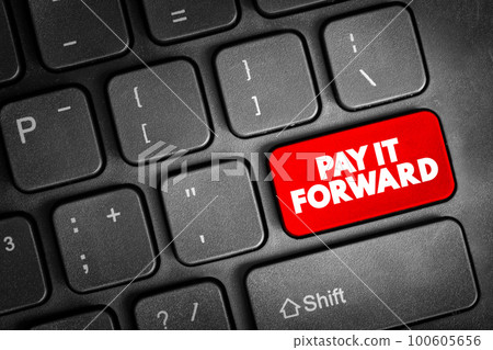 PAY IT FORWARD text button on keyboard, concept background 100605656