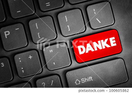 Danke (thank you in german) text button on keyboard, concept background Danke (thank you in german) text button on keyboard, concept background 100605862