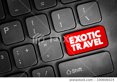 Exotic Travel text button on keyboard, concept background 100606024