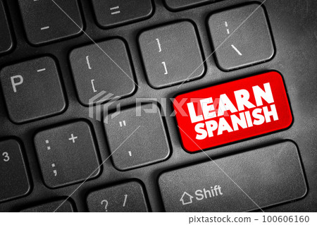 Learn Spanish text button on keyboard, concept background Learn Spanish text button on keyboard, concept background 100606160