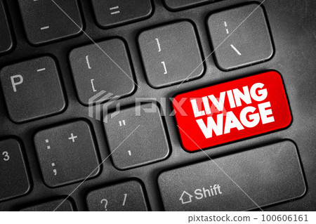 Living Wage text button on keyboard, concept background Living Wage text button on keyboard, concept background 100606161