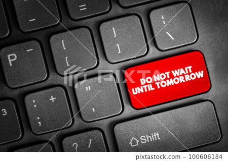 Do Not Wait Until Tomorrow text button on keyboard, concept background 100606184