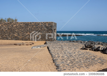 Historical building and Atlantic ocean, Fuerteventura 100606886
