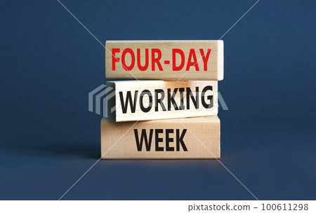 Four-day working week symbol. Concept words Four-day working week on wooden block on a beautiful grey table grey background. Business four-day working week concept. Copy space. 100611298
