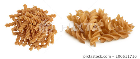 Wolegrain fusilli pasta from durum wheat isolated on white background with full depth of field. Top view. Flat lay. Wolegrain fusilli pasta from durum wheat isolated on white background with full depth of field. Top view. Flat lay. 100611716