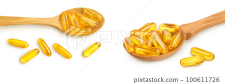 Fish oil capsules in wooden spoon isolated on white background with  full depth of field. Top view. Flat lay 100611726