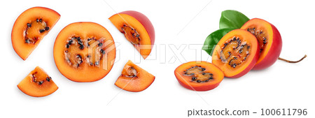 Fresh tamarillo fruit slices with leaves isolated on white background. Top view. Flat lay. Set or collection Fresh tamarillo fruit slices with leaves isolated on white background. Top view. Flat lay. Set or collection 100611796