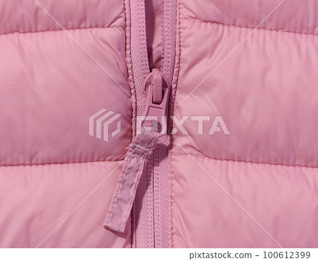 Fragment of a pink jacket with a zipper Fragment of a pink jacket with a zipper 100612399