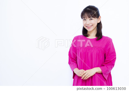 woman wearing pink dress 100613030