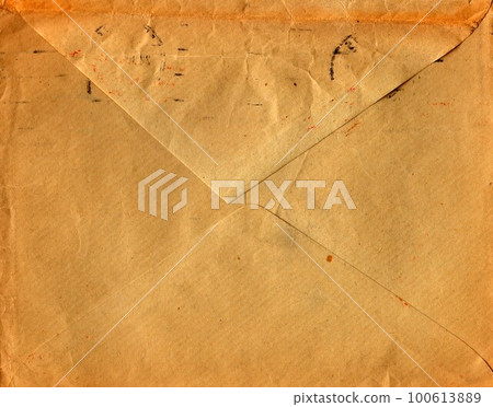 Back of an old used envelope. Rich stain and paper details. Can be used as background 100613889