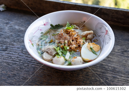 Popular Jabo noodles in Ban Jabo, Thailand made up fo noodles with hard boild eggs and meat ball served with sweet sour soup 100615302