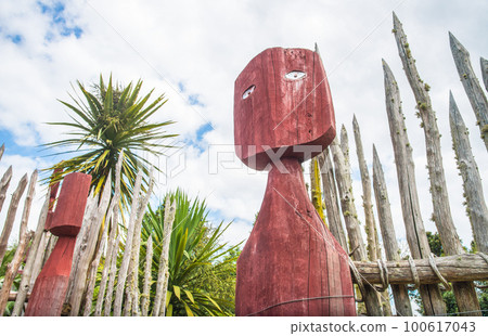 The unknown statue in front of Te Parapara the traditional Maori garden in Hamilton gardens an iconic garden in Hamilton, New Zealand. 100617043