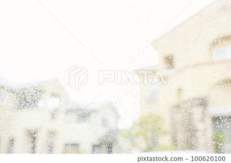 Residential area in the rain seen from the train window Residential area in the rain seen from the train window 100620100