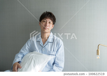A man in his 40s in the bedroom A man in his 40s in the bedroom 100622519