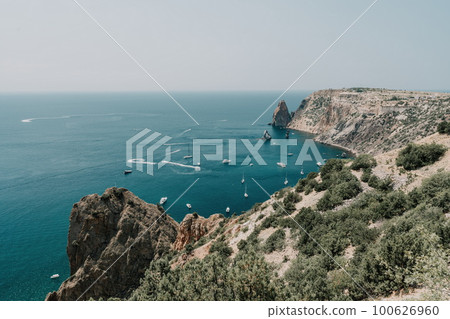 Sea lagoon. Panoramic view on calm azure sea and volcanic rocky 100626960