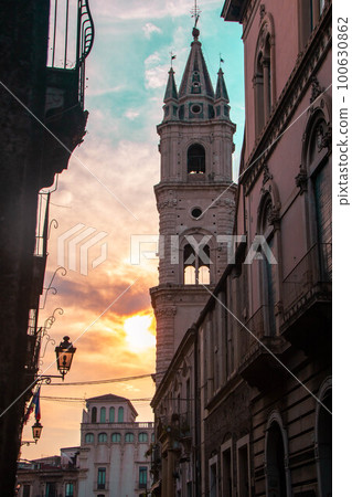 street in the historical center of Acireale at sunset 100630862