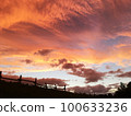 sunset sky and fence silhouette 100633236