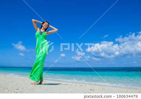 Woman at sea beach 100634479