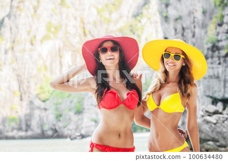 Female friends on vacation 100634480