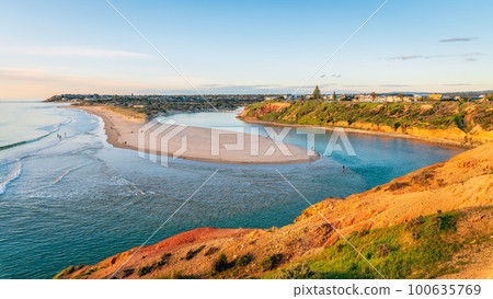 Serene view of the Onkaparinga River mouth in South Port at sunset 100635769