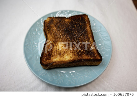 over-baked and burnt bread over-baked and burnt bread 100637076