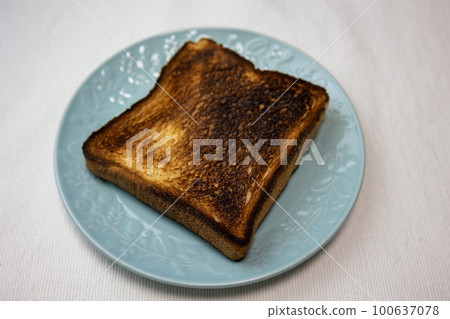 over-baked and burnt bread over-baked and burnt bread 100637078