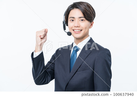 Young male operator doing a guts pose Young male operator doing a guts pose 100637940