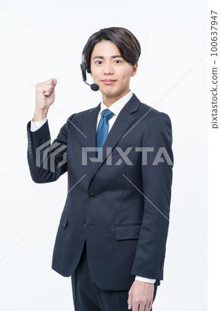 Young male operator doing a guts pose Young male operator doing a guts pose 100637947