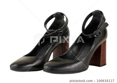 Black leather high brown heels female shoes isolated on white background. 100638117