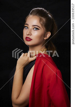 portrait shot of a young Ukrainian woman on the background, after make-up and hairstyle, for clothing advertising 100639517