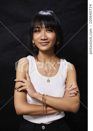 portrait shot of young happy asian or vietnamese woman, enjoying lifestyle, joy, happiness, photo on black background. 100640734