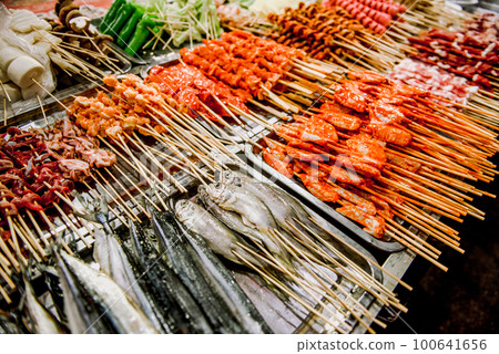 Street for tourists, traditional street food 100641656