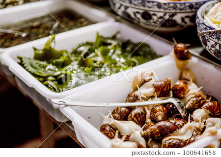 Street for tourists, traditional street food 100641658