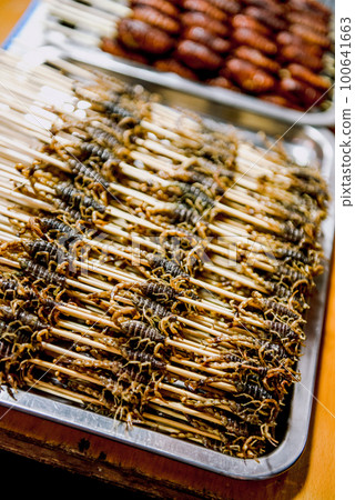 Street for tourists, traditional street food 100641663