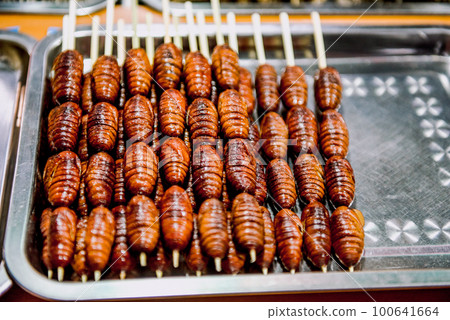 Street for tourists, traditional street food 100641664