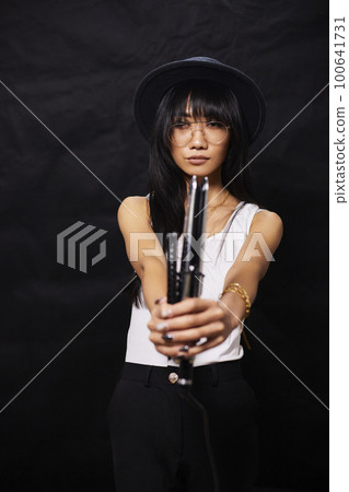 portrait shot of young happy asian or vietnamese woman, enjoying lifestyle, joy, happiness, photo on black background. 100641731