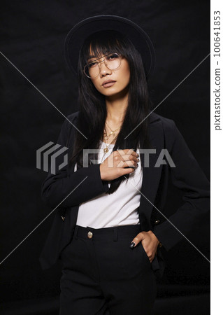 portrait shot of young happy asian or vietnamese woman, enjoying lifestyle, joy, happiness, photo on black background. 100641853