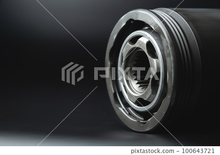 New CV joint on a black background. Constant velocity joint. New spare part 100643721