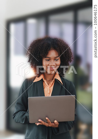 Accountant black woman working on laptop and do document, tax, exchange, accounting and Financial advisor concept 100646175