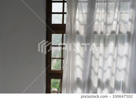 Close up of an abstract old interior window Close up of an abstract old interior window 100647502