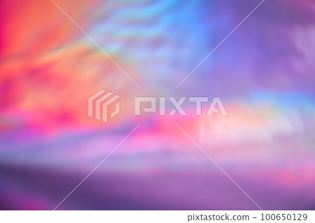 Holographic textures. Shiny foil and metallic rainbow purple gradient. Fashionable neon hologram with glowing patterns for an elegant background logo or your text. High quality photo Holographic textures. Shiny foil and metallic rainbow purple gradient. Fashionable neon hologram with glowing patterns for an elegant background logo or your text. High quality photo 100650129