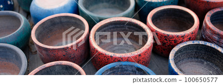 Used empty ceramic flower pots in greenhouse or hothouse Used empty ceramic flower pots in greenhouse or hothouse 100650577