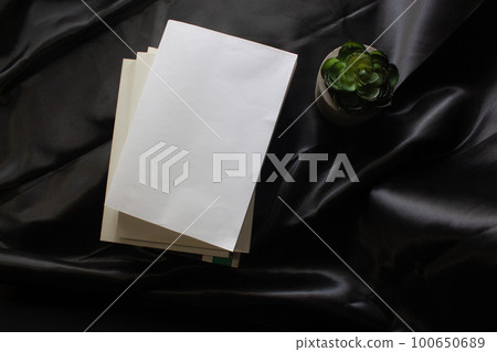 Blank front cover of paperback book or novel book in dark moody style in top view for cover mockup. Blank front cover of paperback book or novel book in dark moody style in top view for cover mockup. 100650689