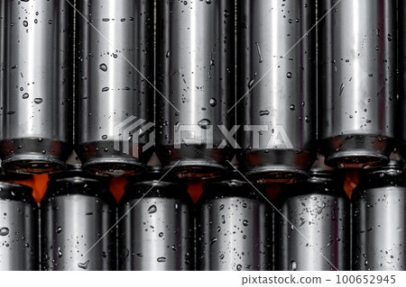 dewy cans of beer in a brewery in a dispatch warehouse dewy cans of beer in a brewery in a dispatch warehouse 100652945