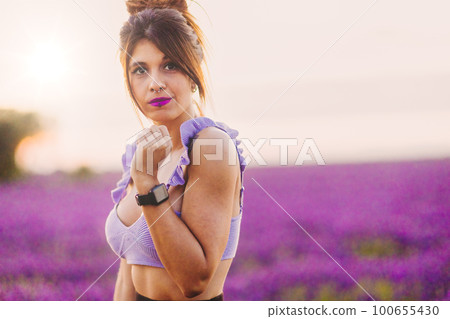 Lavender floral aromatic spring fragance. Hipanic mid woman in nature meadow aromatherapy health Lavender floral aromatic spring fragance. Hipanic mid woman in nature meadow aromatherapy health 100655430